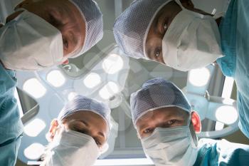 Royalty Free Photo of a View of a Surgical Team as a Patient