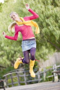 Royalty Free Photo of an Energetic Girl Outside