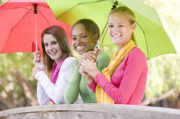 Royalty Free Photo of Girls With Umbrellas