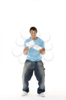 Royalty Free Photo of a Teenage Boy With Papers