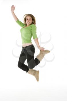 Royalty Free Photo of a Girl Jumping in the Air