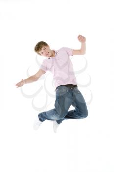 Royalty Free Photo of a Boy Jumping in the Air