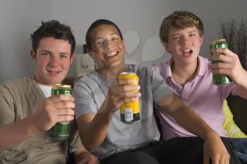Royalty Free Photo of Boys Drinking Beer