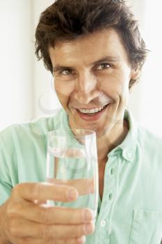 Royalty Free Photo of a Man Drinking Water
