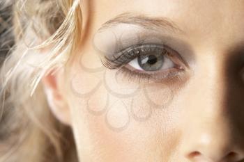 Royalty Free Photo of a Woman in Heavy Eye Makeup