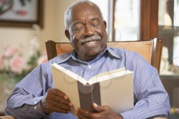 Royalty Free Photo of a Man Reading