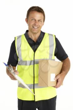 Royalty Free Photo of a Courier With a Clipboard and Parcel