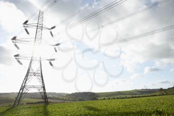 Royalty Free Photo of a Hydro Tower in a Field