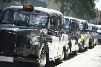 Royalty Free Photo of a Line of London Taxis