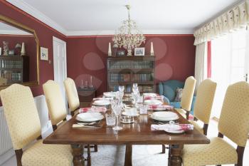 Royalty Free Photo of a Dining Room With the Table Set