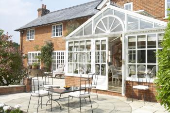 Royalty Free Photo of Large Home With a Conservatory