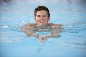 Royalty Free Photo of a Man in a Pool