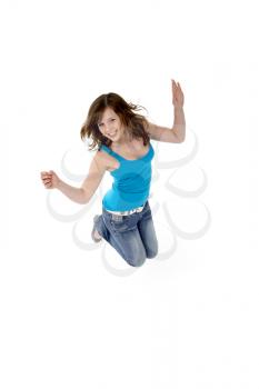 Young Girl Leaping In Studio