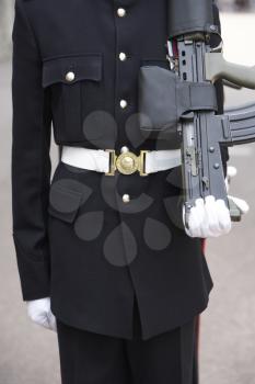 Royalty Free Photo of a Soldier With a Gun