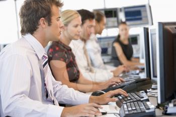 Royalty Free Photo of a Group of People at Computers