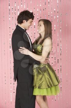 Royalty Free Photo of a Young Couple Dressed for a Party
