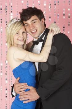 Royalty Free Photo of a Young Couple Dressed for a Party