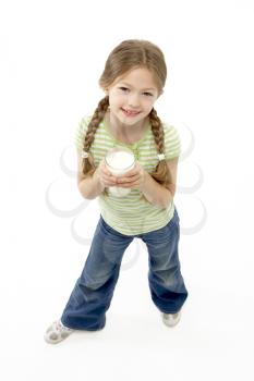 Royalty Free Photo of a Girl With a Glass of Milk