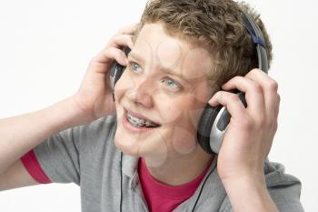 Royalty Free Photo of a Teen Listening to Music