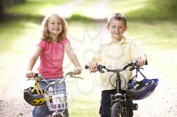 Royalty Free Photo of Two Children on Bikes