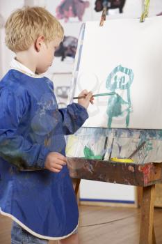 Royalty Free Photo of a Boy Painting