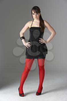 Royalty Free Photo of a Girl in Red Tights