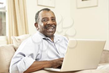 Royalty Free Photo of a Man With a Computer