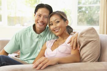 Royalty Free Photo of an Asian Couple at Home