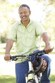 Royalty Free Photo of a Man on a Bike