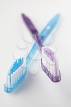 Crossed toothbrushes