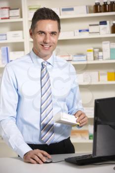 UK pharmacist at work