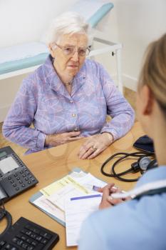 Senior woman patient with UK nurse