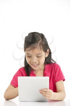 Studio Shot Of Chinese Girl With Digital Tablet