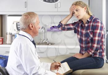 Teenage Girl Visits Doctor's Office With Headaches