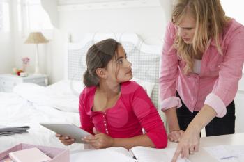 Mother Catches Daughter Using Tablet Computer When Meant To Be Studying