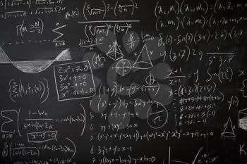 Blackboard with maths statistics, equations and ideas