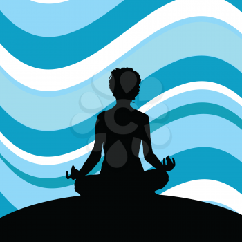 Silhouette of a female meditating