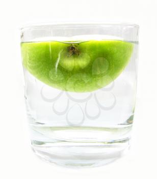 Apple in glass of water