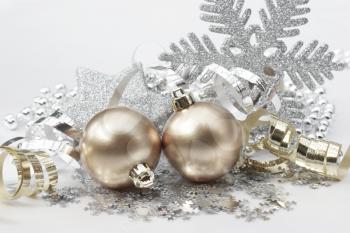 Christmas background with decorations in gold and silver