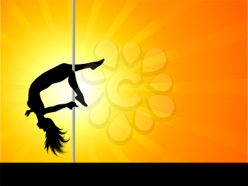 Silhouette of an acrobatic pole dancer