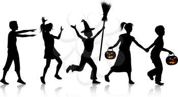 Silhouettes of children playing on Halloween night