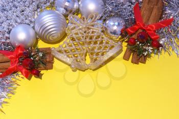 Christmas decorations on a bright yellow background