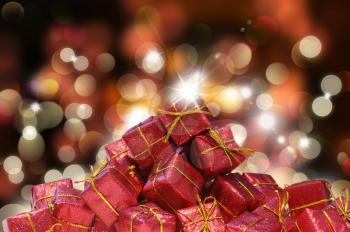 Christmas gifts against a bokeh lights background