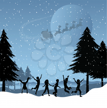 Silhouettes of children playing in the snow with santa flying in the sky