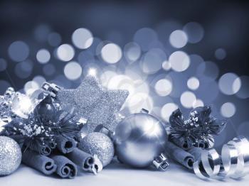 Royalty Free Photo of Christmas Decorations on a Blurred Light Background