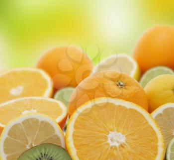 Royalty Free Photo of Oranges, Limes, Lemons and Kiwi