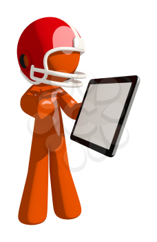 Football player orange man holding a tablet likely using a sports app or tracking scores.