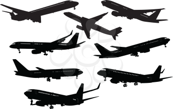 Royalty Free Clipart Image of Airplane Silhouettes