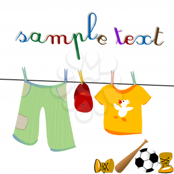 Little boy clothes on clothesline and toys