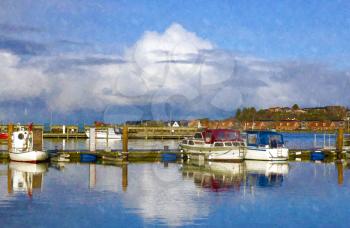 Small Danish harbor with fishing ships background